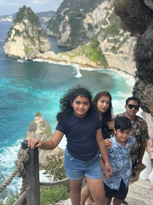 Family of guests at the Diamond Beach viewpoint, East Nusa Penida